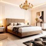 Luxurious bedroom with a large bed, chandelier, and decorative elements.
