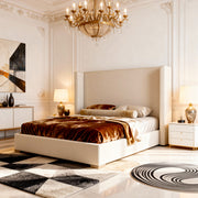 Luxurious bedroom with a large bed, chandelier, and decorative elements.
